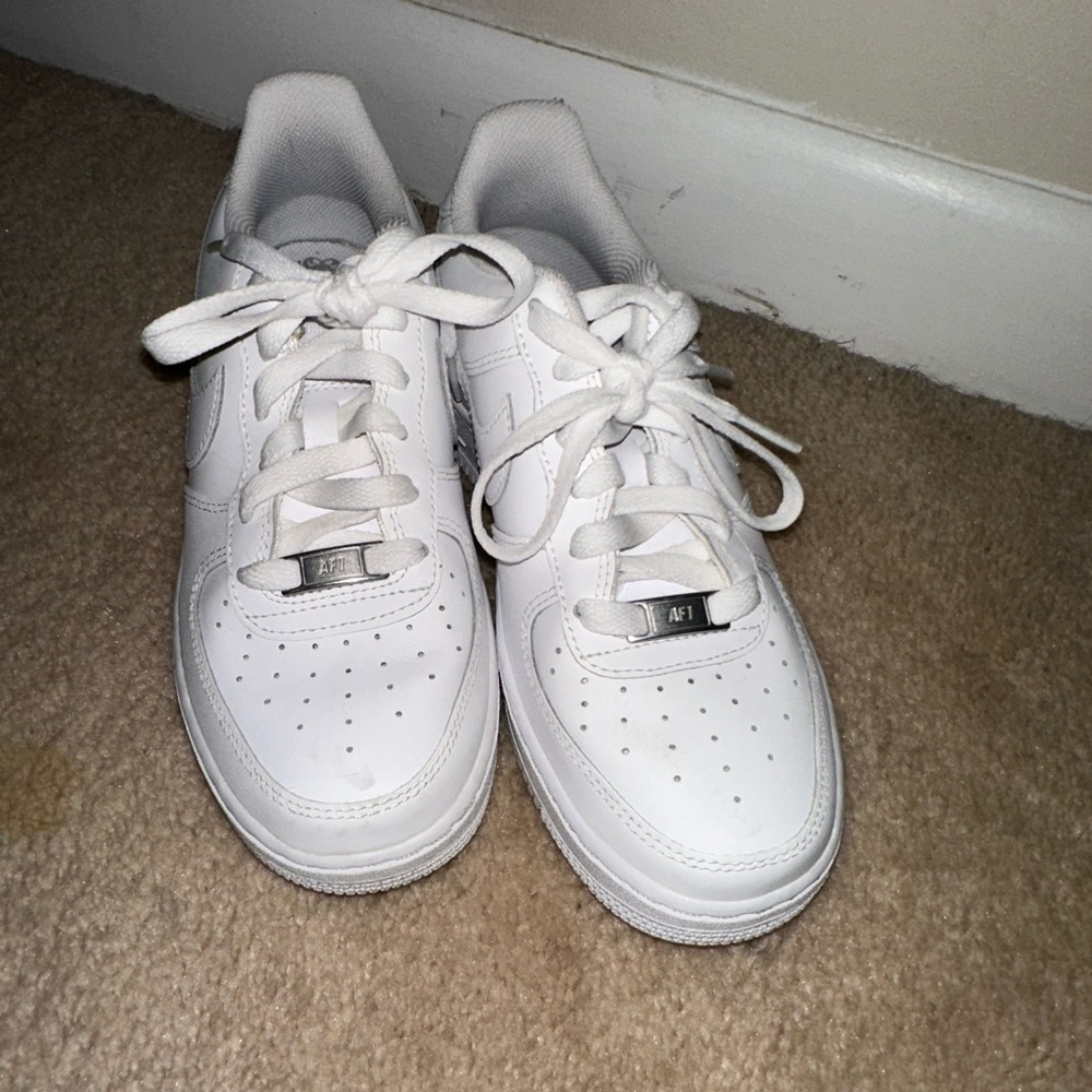White Nike Air Force 1. Size 5Y but can fit most women size 6. Worn once